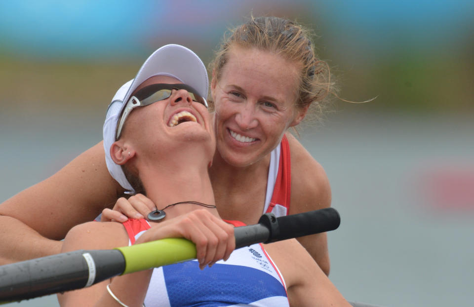 WINDSOR, ENGLAND - AUGUST 01: Helen Glover and Heather Stanning of Great Britain celebrate in their boat after winning gold in the Women's Pair Final A on Day 5 of the London 2012 Olympic Games at Eton Dorney on August 1, 2012 in Windsor, England. (Photo by Eric Feferberg - IOPP Pool / Getty Images)