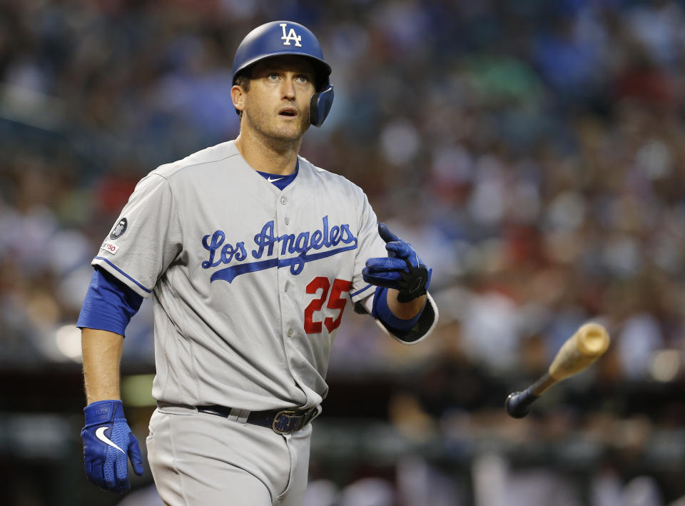 FILE - In this June 3, 2019, file photo, Los Angeles Dodgers third baseman David Freese tosses his bat in the first inning during a baseball game against the Arizona Diamondbacks in Phoenix. David Freese is retiring after a 10-year career that included a World Series title in 2011 with the St. Louis Cardinals when he was MVP. The 36-year-old infielder made the announcement Saturday, Oct. 12, 2019, on his verified Twitter account. (AP Photo/Rick Scuteri, File)