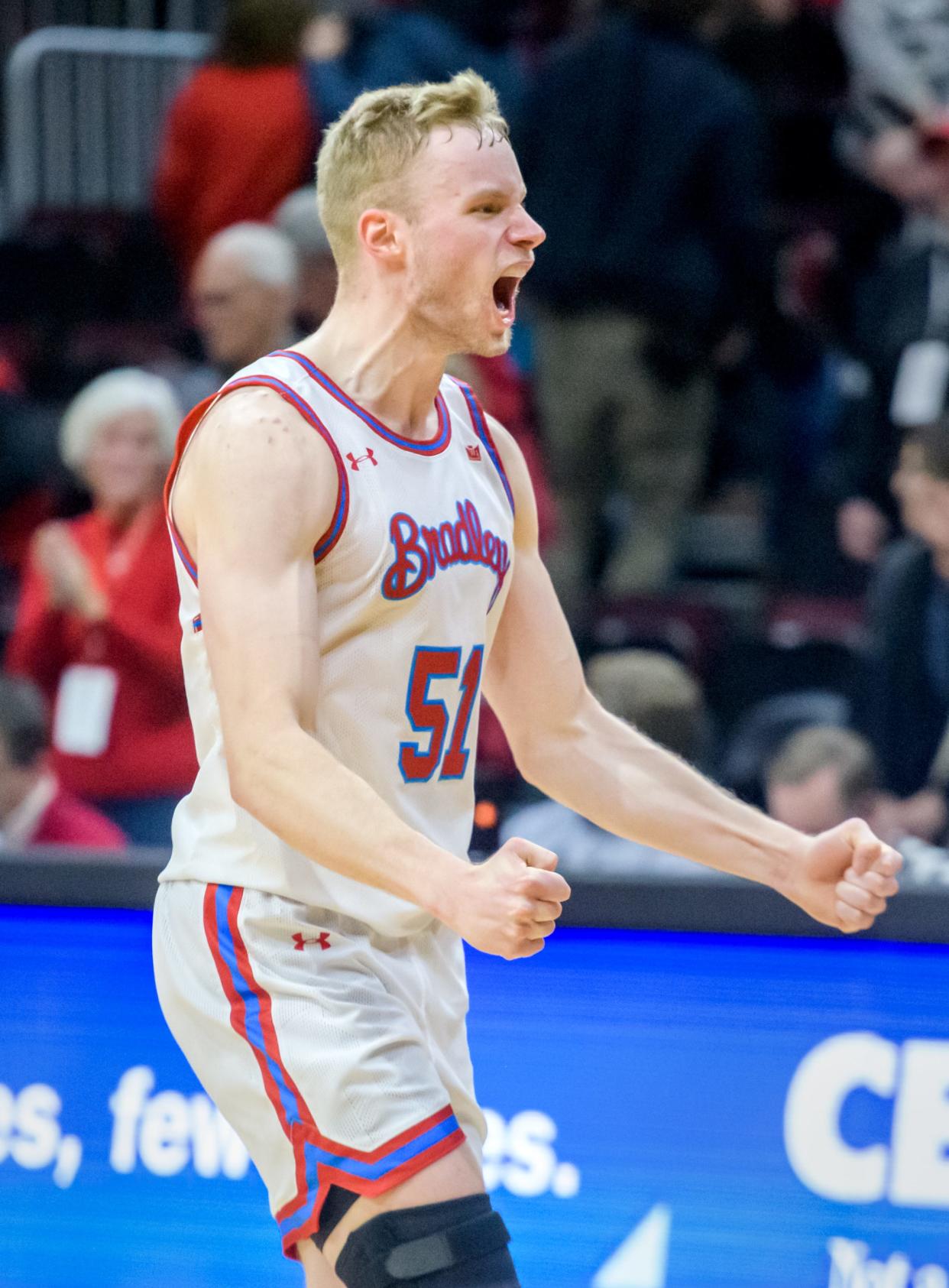 Bradley's Rienk Mast celebrates the Braves' 62-52 victory over SIU on Wednesday, Feb. 1, 2023 at Carver Arena.