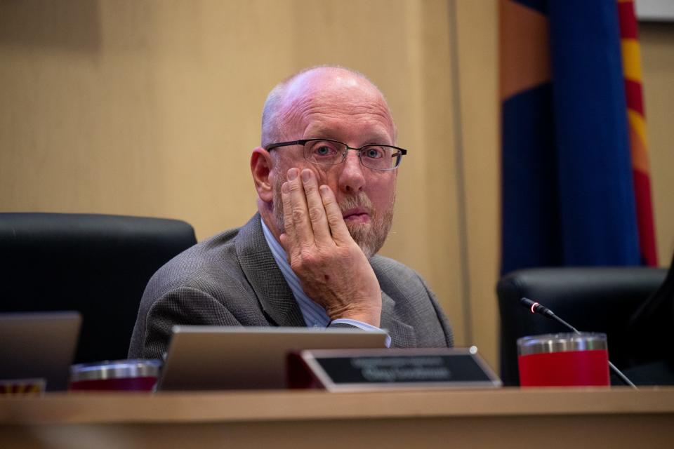 Buckeye Mayor Eric Orsborn listens as residents speak during a City Council meeting on May 2, 2023.