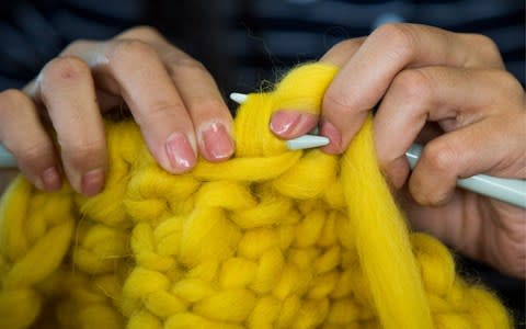 Knitting can help people battle chronic pain, depression and social isolation - Credit: Sergei Bobylev TASS 