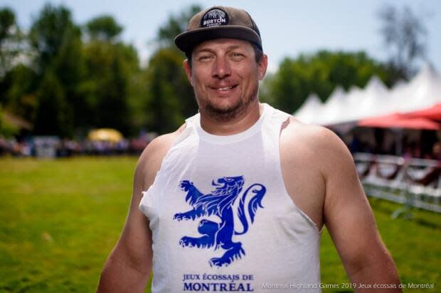 Jason Baines, raised in Greenfield Park, is the athletic director of the Montreal Highland Games. On Sunday, he will attempt to beat the Guinness World Record for the most tosses in an hour. (Montreal Highland Games - image credit)