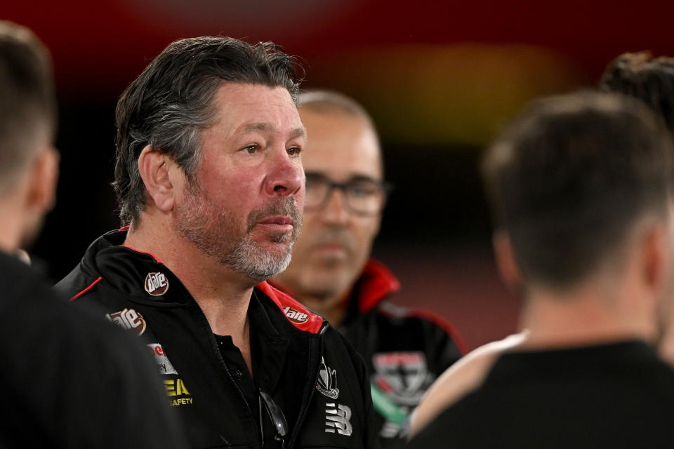 Brett Ratten, pictured here speaking to the players during St Kilda's clash with Sydney.