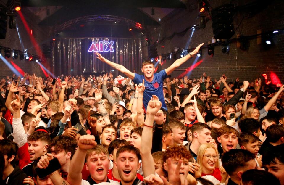 Fans watrch the game at the Depot Mayfield in Manchester (REUTERS)