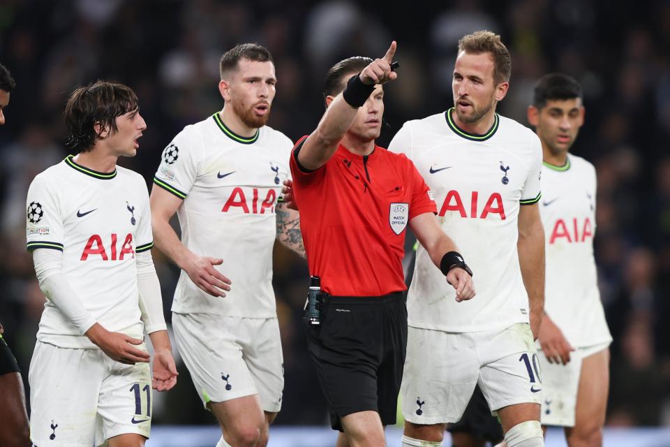 Referee Danny Makkelie gestures as Tottenham players react (AP)