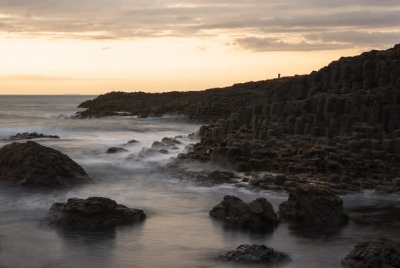 During a trip to Northern Ireland, Sarah Boulton used a 2.5-second exposure to blur the water at Giant's Causeway. The iconic formation comprises about 40,000 interlocking basalt columns, part of the Antrim lava group that formed during the Pal