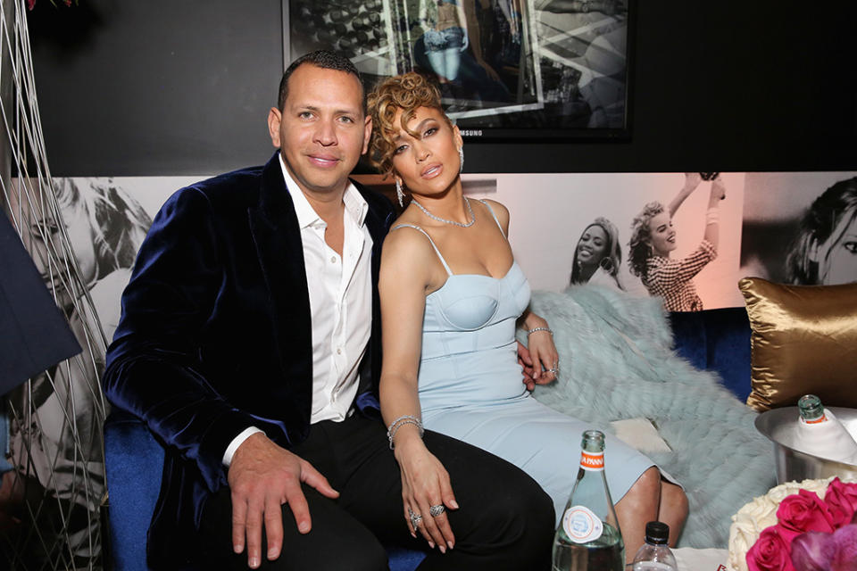 <p>Is it hot in here? The sexy couple stayed close at the Guess Spring 2018 campaign reveal in Los Angeles on Wednesday night, starring none other than J.Lo herself. (Photo: Rachel Murray/Getty Images for Guess, Inc.) </p>