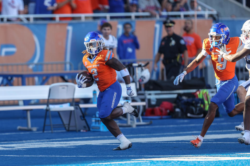 BOISE, ID - OCTOBER 5: Running back Ashton Jeanty #2 of the Boise State Broncos scores his first touchdown of the night during the first half against the Utah State Aggies at Albertsons Stadium on October 5, 2024 in Boise, Idaho. (Photo by Loren Orr/Getty Images)