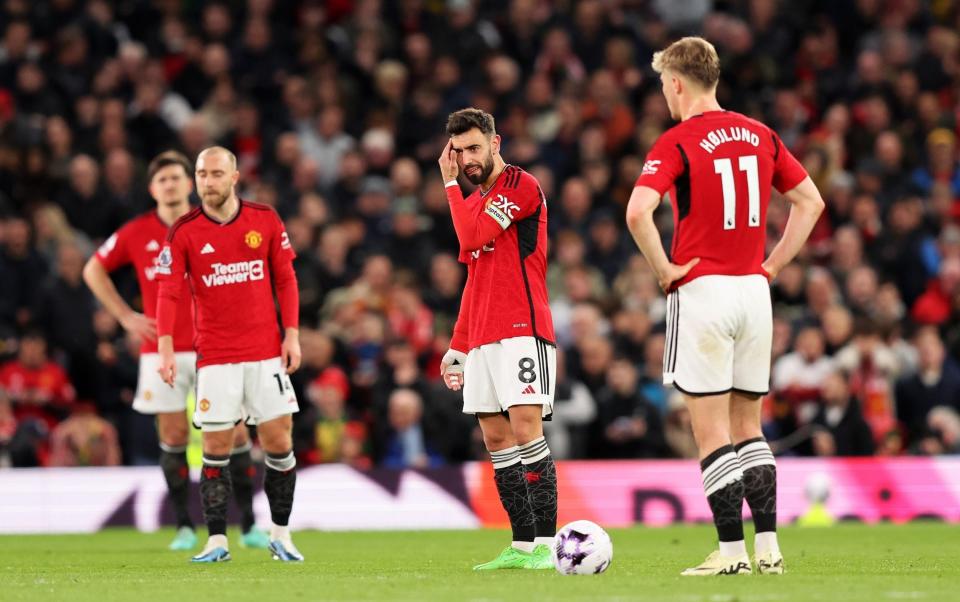 Bruno Fernandes of Manchester United looks dejected after their side concedes the first goal scored by Jayden Bogle of Sheffield United (not pictured) during the Premier League match between Manchester United and Sheffield United at Old Trafford on April 24, 2024 in Manchester, England.