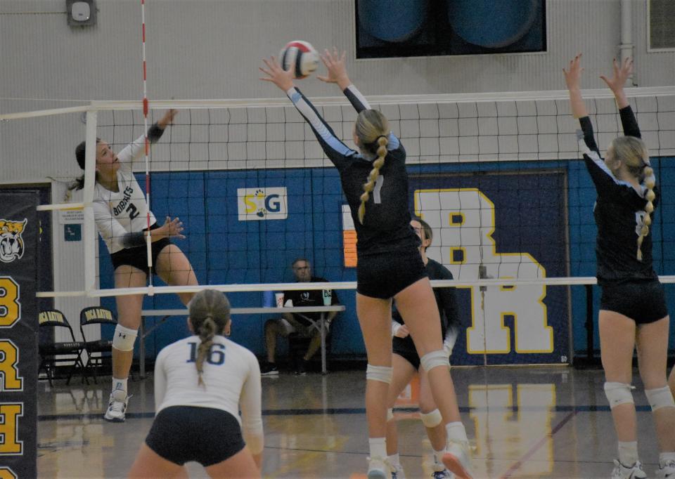 Boca Raton's Natalie Depaula slams the ball across the net during the Bobcats' regional quarterfinals game against Palmetto on Oct. 25, 2023.