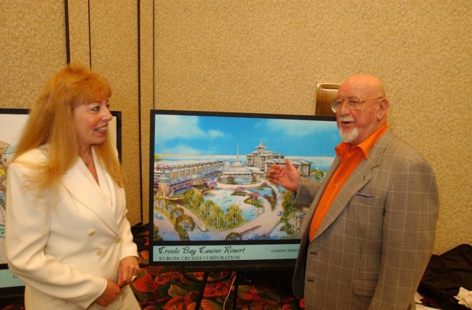 Europa Cruises Corporation President and CEO Deborah Vitale, left, looks for a commitment from Legendary jazz musician and Mississippian Pete Fountain following a presentation at the Southern Gaming Summit 2002 in Biloxi. Europa, which later became Diamondhead Casino Corp., has planned for years to build a destination resort on 440 acres the company owns at Diamondhead. Fountain, who died in 2016, was a shareholder in the company and had indicated an interest in opening a club at the casino.