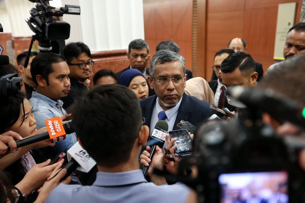 Deputy Minister Hanipa Maidin speaks to reporters at the Parliament lobby in Kuala Lumpur March 14, 2019. — Picture by Ahmad Zamzahuri