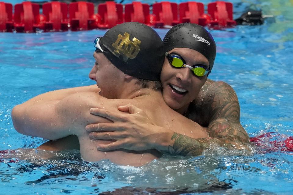Chris Guiliano and Caeleb Dressel embrace after the Men's 50 freestyle finals Friday, June 21, 2024, at the US Swimming Olympic Trials in Indianapolis. (AP Photo/Darron Cummings)