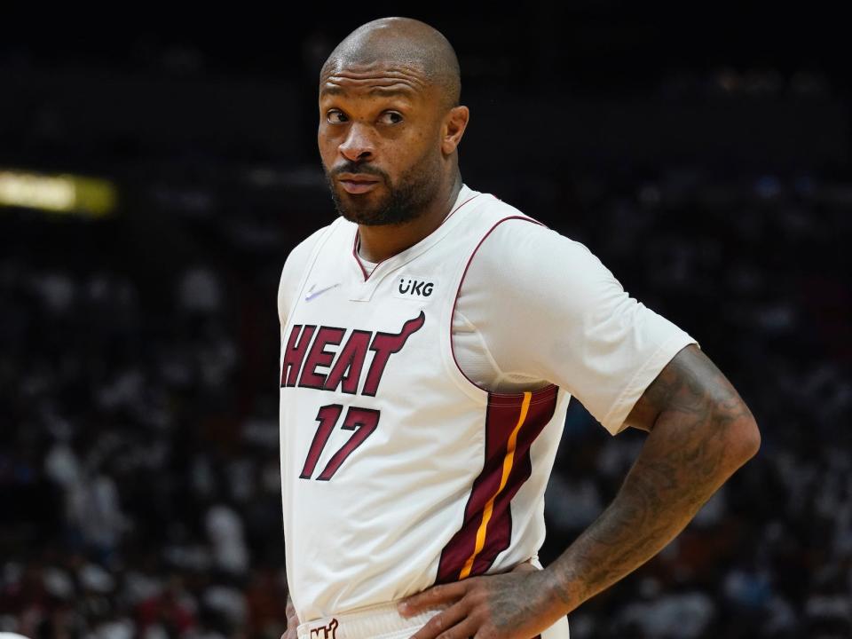 PJ Tucker looks on while standing during a game.