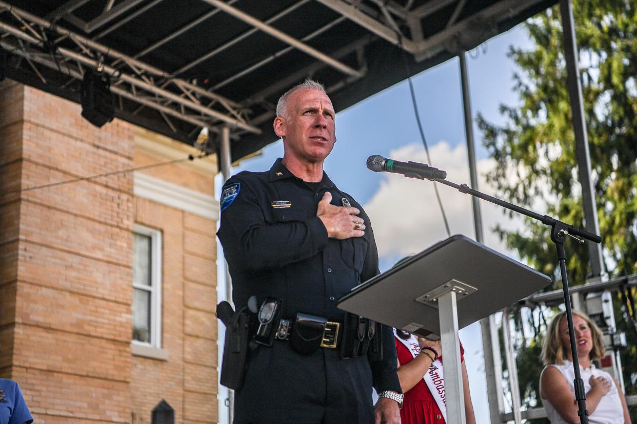 Hendersonville Police Cheif Blair Myhand recites the pledge at the 75th annual North Carolina Apple Festival on Sept. 3, 2021 in Hendersonville.