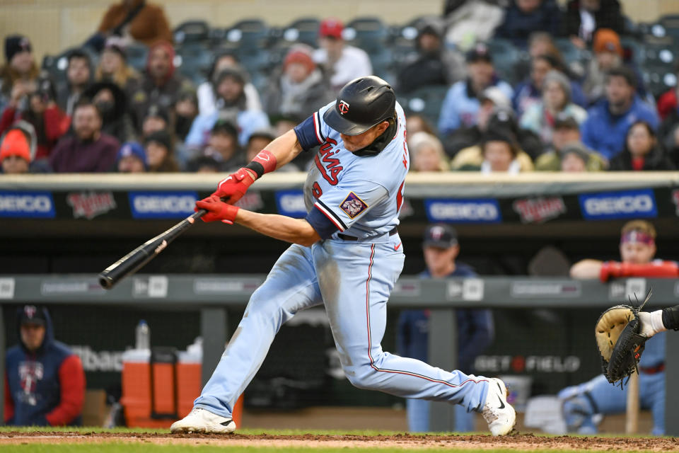 Minnesota Twins' Max Kepler hits a two-run home run off Detroit Tigers pitcher Eduardo Rodriguez during the fourth inning of a baseball game Tuesday, April 26, 2022, in Minneapolis. (AP Photo/Craig Lassig)