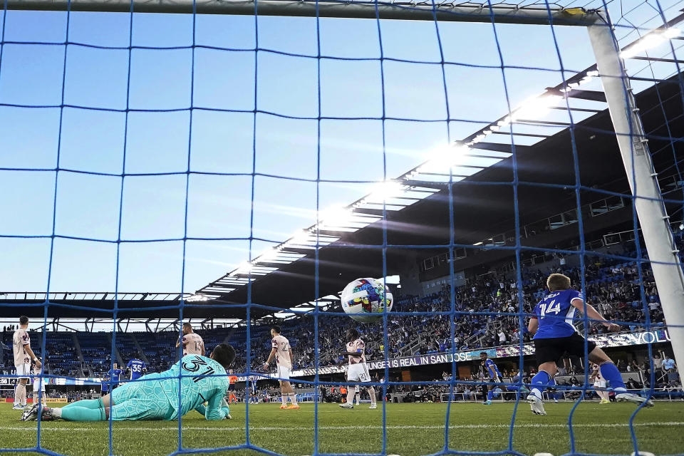 Portland Timbers goalkeeper Aljaž Ivačič (31) can not make the stop on a goal by San Jose Earthquakes midfielder Jackson Yueill (14) during the first half of an MLS soccer match in San Jose, Calif., Wednesday, May 18, 2022. (AP Photo/Tony Avelar)