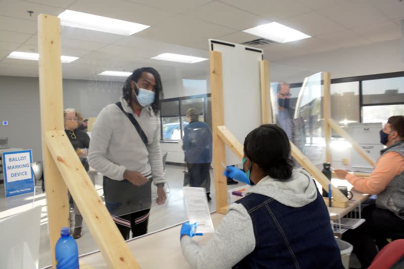 FILE PHOTO: Minnesota voters head to the polls for early voting