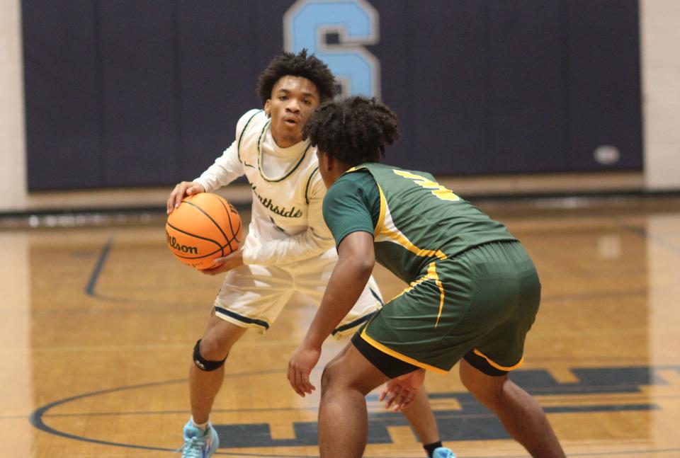 Northside's Savion Pepper goes towards the basket against White Oak on Thursday.