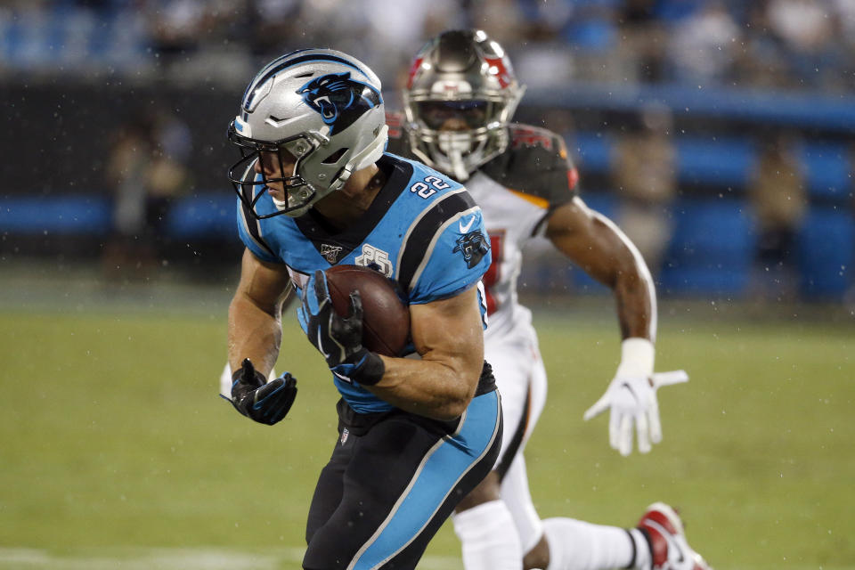 Carolina Panthers running back Christian McCaffrey (22) runs against the Tampa Bay Buccaneers during the first half of an NFL football game in Charlotte, N.C., Thursday, Sept. 12, 2019. (AP Photo/Brian Blanco)