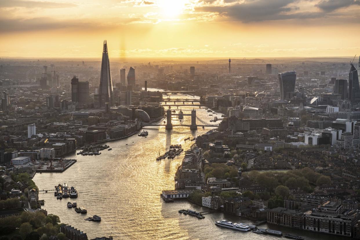 Sunset over London. Looking up the River Thames past Wapping to Tover Bridge, the Shard and the City of London. (Photo: Jason Hawkes/Caters News)