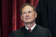 FILE - Associate Justice Samuel Alito sits during a group photo at the Supreme Court in Washington, April 23, 2021. The Supreme Court has ended constitutional protections for abortion that had been in place nearly 50 years — a decision by its conservative majority to overturn the court's landmark abortion cases. (Erin Schaff/The New York Times via AP, Pool, File)