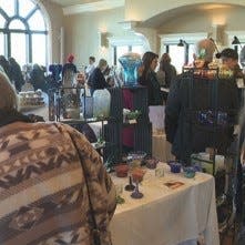 Visitors browse at a holiday market at Casa Larga Vineyards in Perinton.