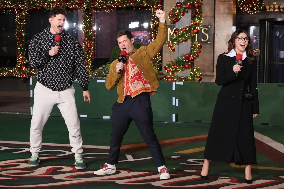 Flula Borg, Adam Devine and Sarah Hyland perform during the rehearsals for the 96th Macy's Thanksgiving Day parade at Macy's Herald Square on November 22, 2022 in New York City.