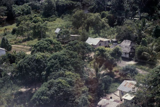 <p>UPI/Bettmann Archive/Getty</p> Aerial view of buildings at the People's Temple compound in Jonestown, Guyana.