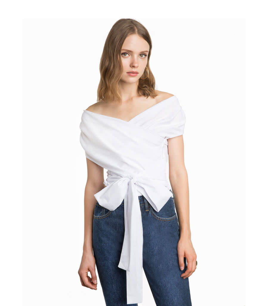 <p>White wrap off-the-shoulder shirt, $98, <a rel="nofollow noopener" href="https://www.pixiemarket.com/collections/tops/products/white-wrap-off-the-shoulder-shirt" target="_blank" data-ylk="slk:pixiemarket.com;elm:context_link;itc:0;sec:content-canvas" class="link ">pixiemarket.com</a> </p>