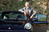 F.A. Porsche posing with a 964 series 911.