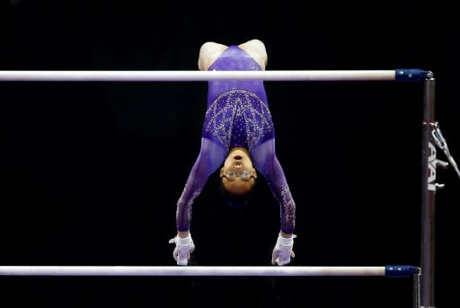 Morgan Hurd competes on the uneven bars