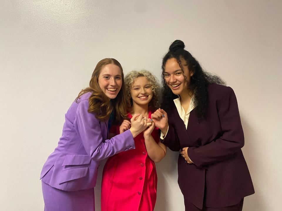 Judy (Madeline Galgano), Doralee (Samantha Sperling), and Violet (Lusitania Halaifonua) pose in glory after they take over the office and change it for good in John Jay's "9 to 5: The Musical."