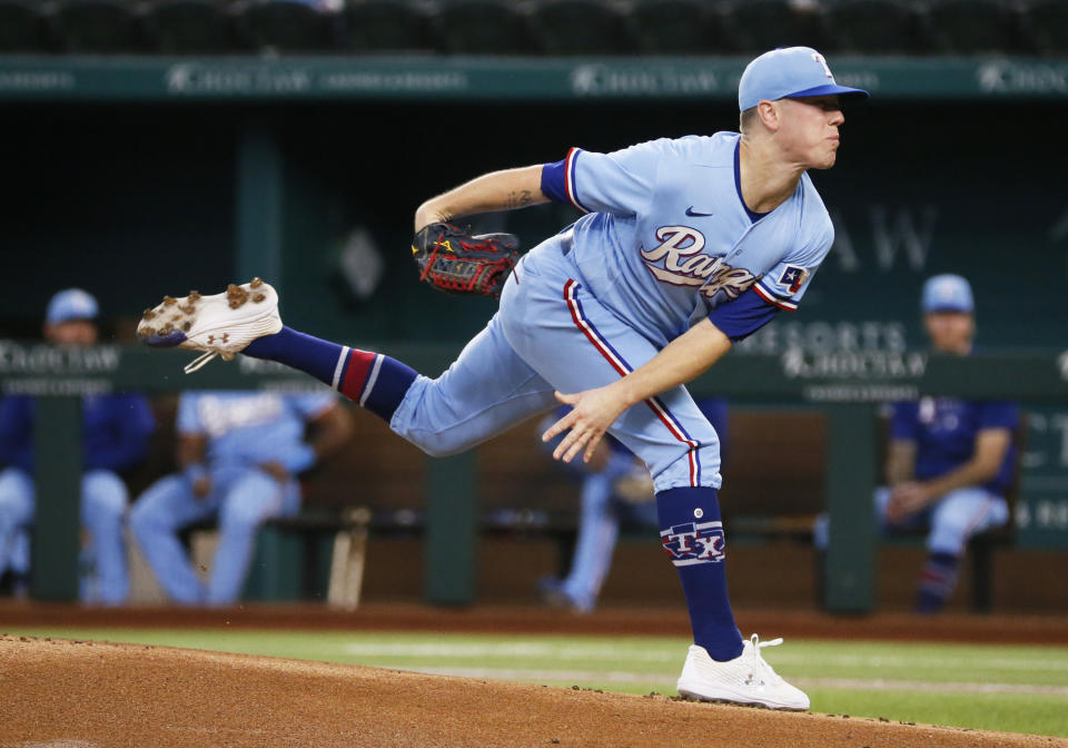 Texas Rangers starting pitcher Kolby Allard throws to the plate against the Oakland Athletics during the first inning of a baseball game in Arlington, Texas, Sunday, July 11, 2021. (AP Photo/Ray Carlin)