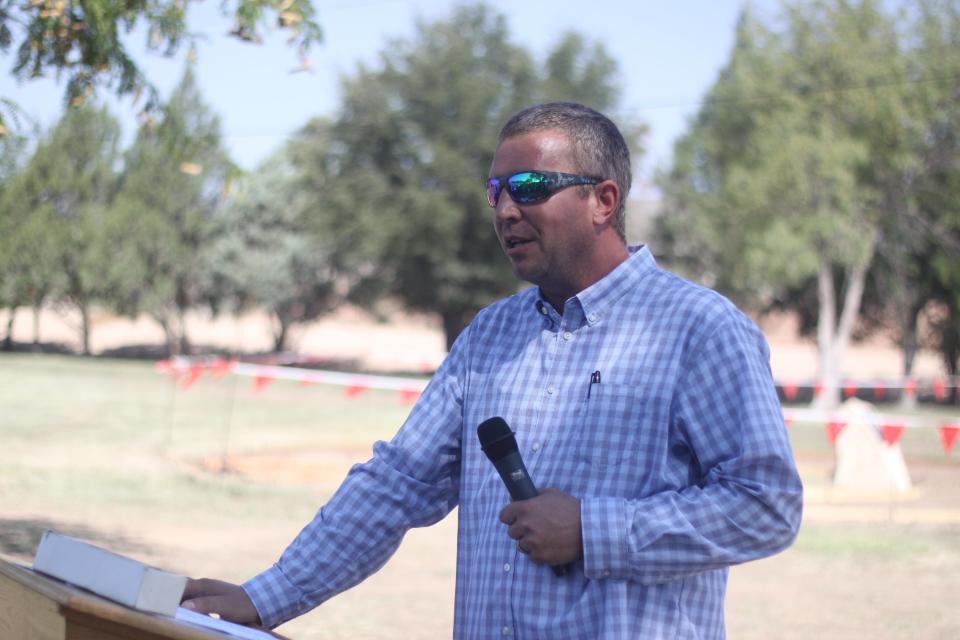 Eddy County Facilities Director Brian Stephens speaks during a ceremony to dedication a local park to the late Capt. Roger Sawyers, Aug. 17, 2018 in Carlsbad.