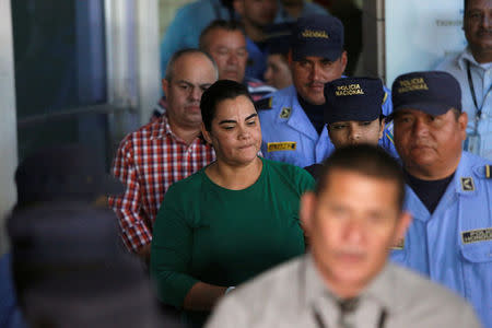 Former first lady Rosa Elena Bonilla de Lobo gestures while heading to court on corruption charges in Tegucigalpa, Honduras February 28, 2018. REUTERS/Jorge Cabrera