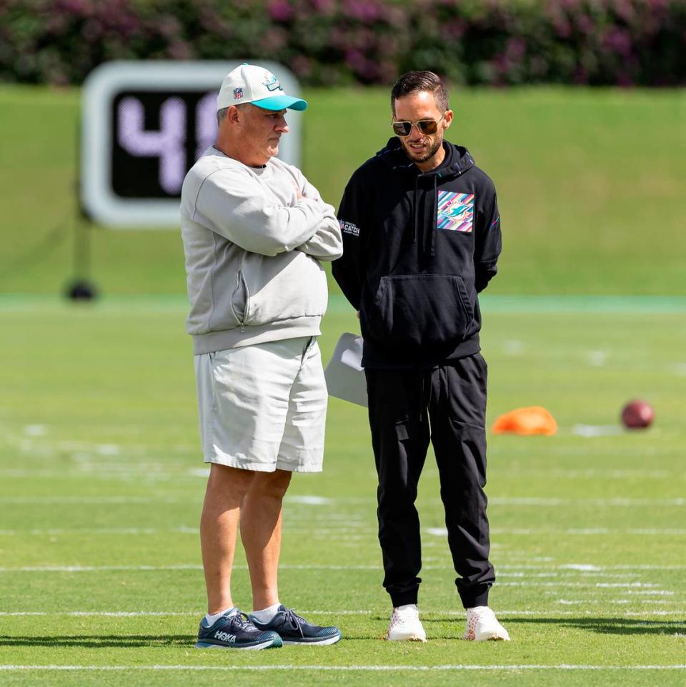 Miami Dolphins defensive coordinator Vic Fangio and head coach Mike McDaniel speak during team practice at the Baptist Health Training Complex on Wednesday, Oct. 18, 2023 in Miami Gardens, Fla.