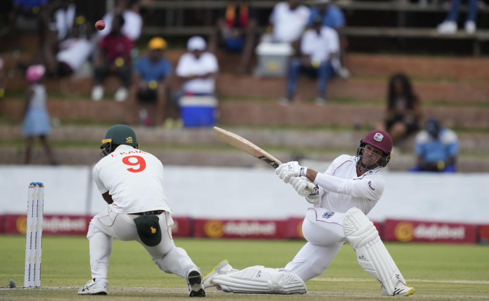 West Indies batsman Tagenarine Chanderpaul plays a shot on the first day of the second Test cricket match between Zimbabwe and West Indies at Queens Sports Club in Bulawayo, Zimbabwe, Sunday, Feb. 12, 2023. (AP Photo/Tsvangirayi Mukwazhi)