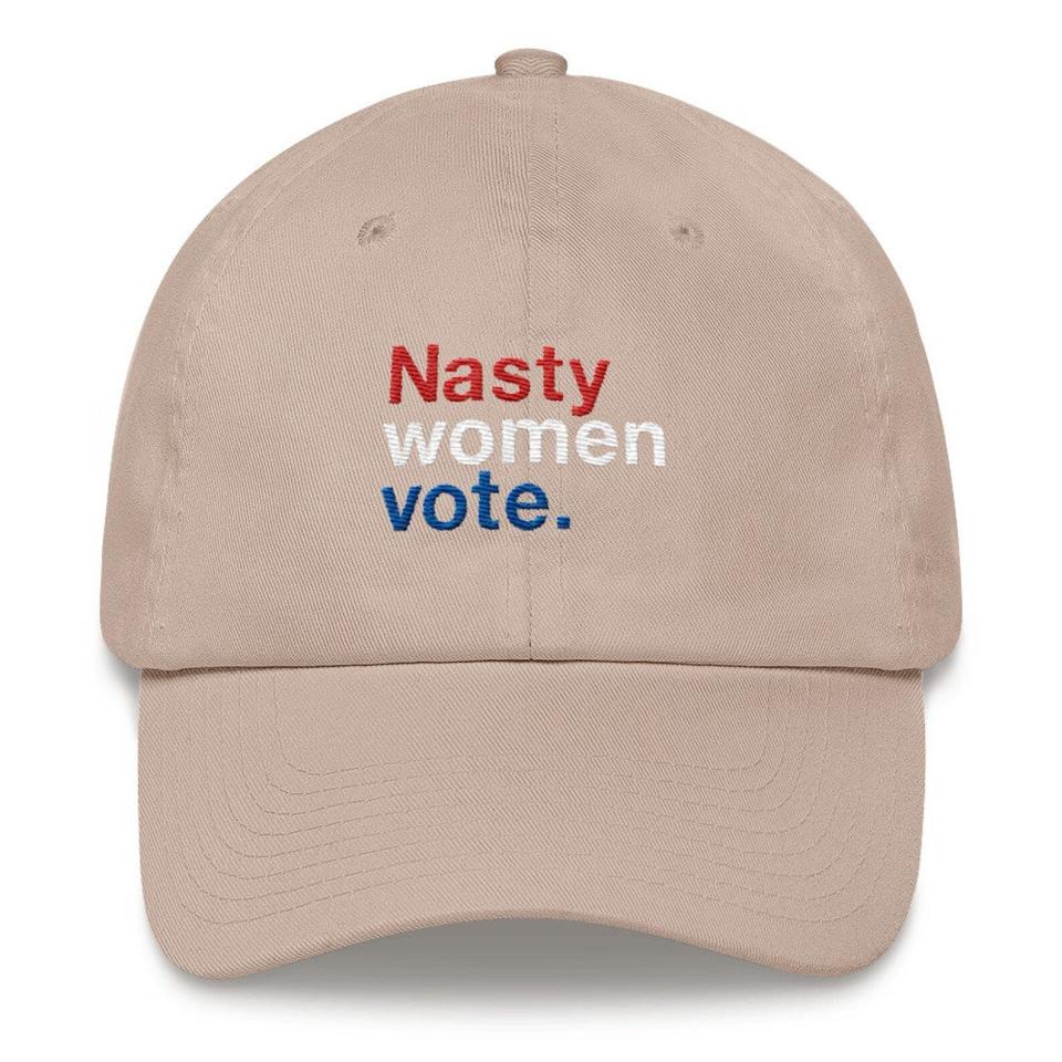 Get the <a href="https://www.etsy.com/listing/630726485/nasty-women-vote-dad-hat-womens-rights?gpla=1&amp;gao=1&amp;&amp;utm_source=google&amp;utm_medium=cpc&amp;utm_campaign=shopping_us_b-accessories-hats_and_caps-baseball_and_trucker_caps&amp;utm_custom1=72b1af8f-1659-4a04-aa5f-fd68e79c0f77&amp;utm_content=go_2063557627_76452855575_367965824811_pla-354202314881_c__630726485&amp;utm_custom2=2063557627&amp;gclid=EAIaIQobChMIiq2wwuup6wIVEm-GCh3P1APeEAQYBSABEgJdjfD_BwE" target="_blank" rel="noopener noreferrer">Stay and Design nasty women vote hat from Etsy﻿</a> for $22.50.