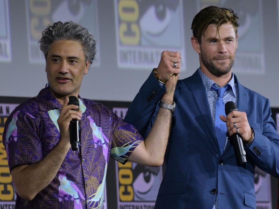 Taika Waititi and Chris Hemsworth in 2019, with Tessa Thompson.