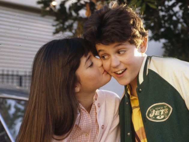 <b>8. Fred Savage and Danica McKellar had a mutual crush<br><br></b>Fred Savage admitted to having a mutual crush on Danica McKellar during filming, which evolved into more of a brother-sister relationship. In an article in <a href="http://www.people.com/people/archive/article/0,,20131619,00.html" rel="nofollow noopener" target="_blank" data-ylk="slk:People magazine;elm:context_link;itc:0;sec:content-canvas" class="link ">People magazine</a>, Savage once confessed, "I was in love with her for the same reasons every other boy fell in love with her. You won't meet a sweeter, nicer girl -- and she's gorgeous." <br><br> While they said that it started as a mutual crush, the co-stars ultimately developed a more sibling-type bond. Eventually, as siblings are known to do, Savage admitted, "all I wanted to do was irritate her." Savage, now 36, and McKellar, 38, remain friends to this day.