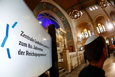 A man wearing a kippah is seen before a ceremony to mark the 80th anniversary of Kristallnacht, also known as the Night of Broken Glass, at Rykestrasse Synagogue, in Berlin, Germany, November 9, 2018. REUTERS/Fabrizio Bensch