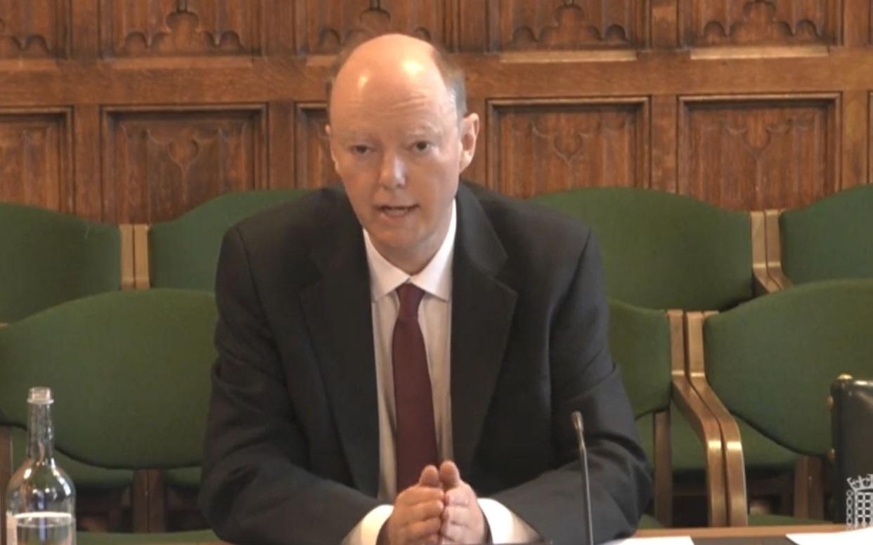 Prof Chris Whitty told MPs that vaccines could reduce the risk by at least 50 per cent - PA Wire