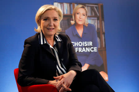 Marine Le Pen, French National Front (FN) candidate for 2017 presidential election, poses before an interview with Reuters in Paris, France, May 2, 2017. REUTERS/Charles Platiau