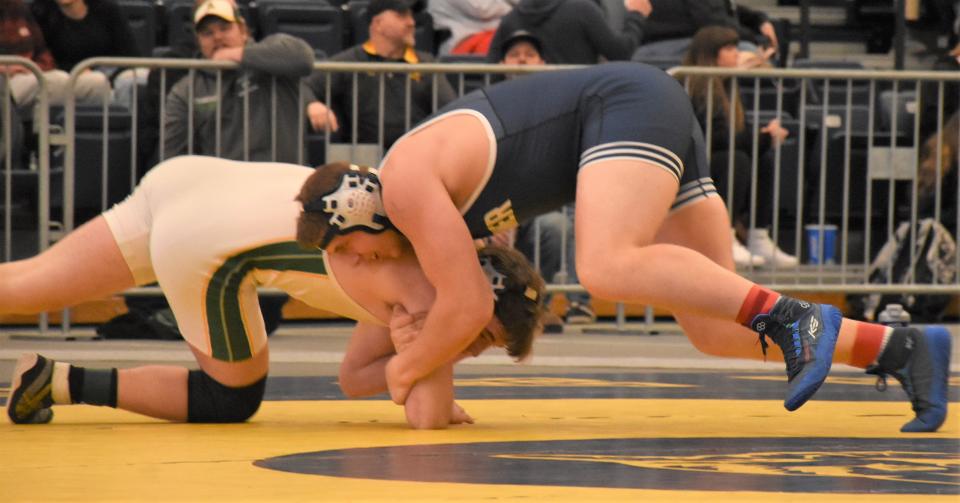 Unbeaten Homer senior Sam Sorenson (right) competes with Adirondack Wildcat Isaac Croneiser during the 215-pound title bout at Section III's Division II tournament. He will defend the state championship he won last year this weekend.