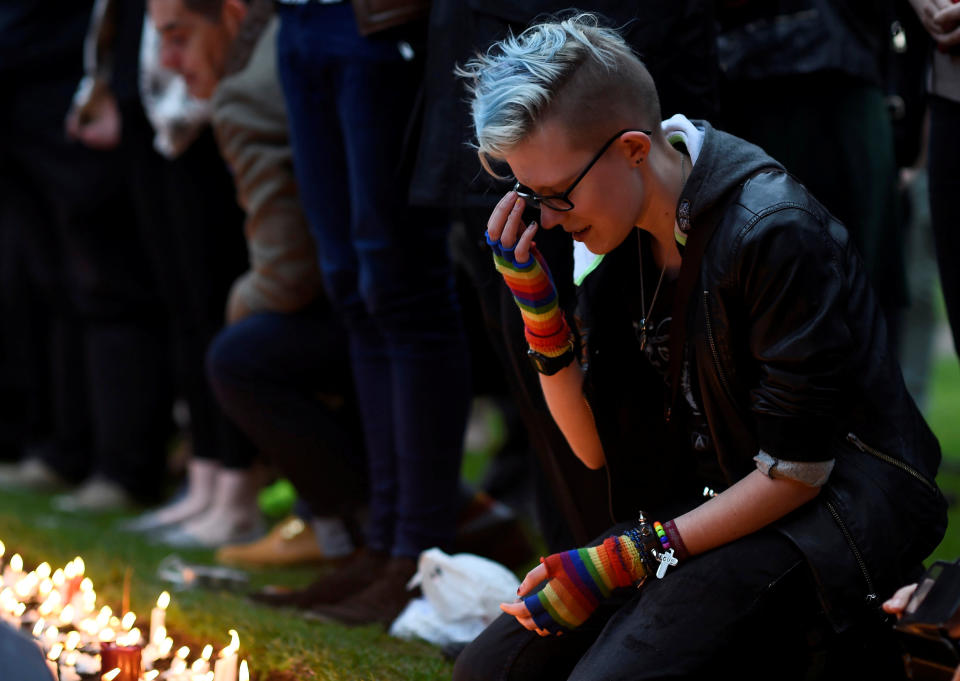 People light candles during a vigil in memory of the victims of the gay nightclub mass shooting in Orlando, at St Anne's church in the Soho district of London, June 13, 2016.&nbsp;