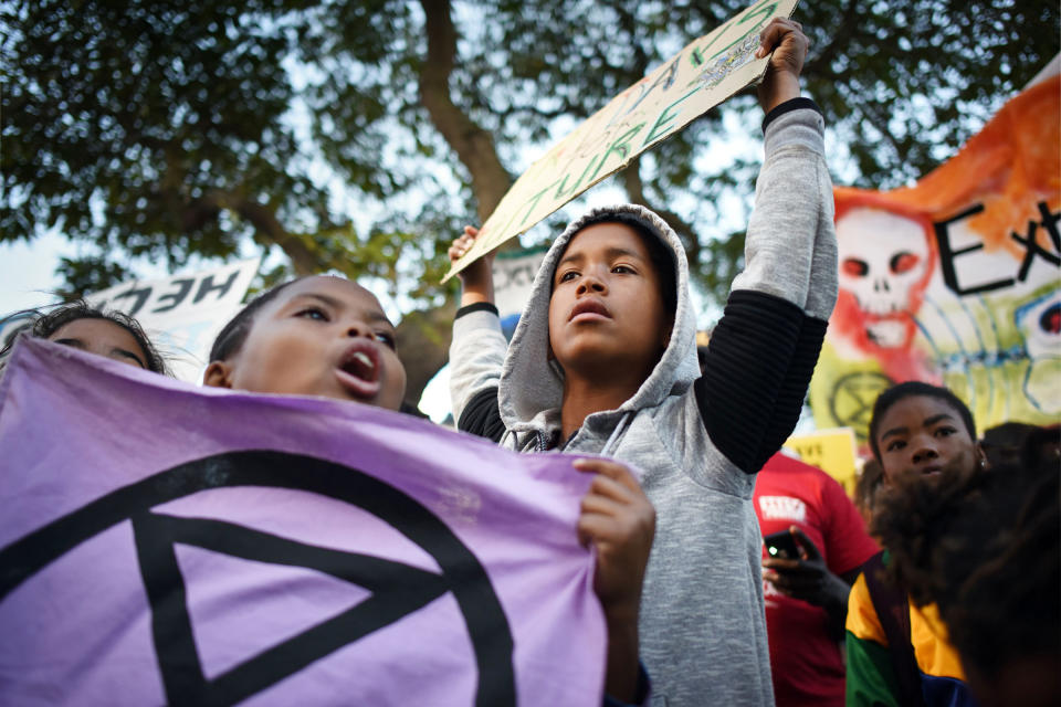 Young XR activists demonstrate outside South Africa’s Parliament in Cape Town on June 1. | Rodger Bosch—AFP/Getty Images