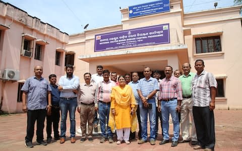 Dr Pramila Baral with her team outside the National Vector Borne Disease Control Programme Centre - Credit: Catherine Davison