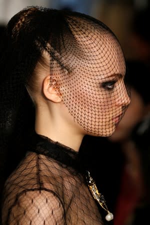 A model presents a creation by designer Maria Grazia Chiuri as part of her Haute Couture Fall/Winter 2019/20 collection show for fashion house Dior in Paris