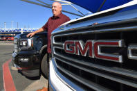 Carey ÒCWÓ Williams, general manager of James Wood MotorsÕ General Motors Company (GMC) shows off new high-end GMC Denali pickup trucks out on his lot in Decatur, Texas, U.S., February 4, 2019. REUTERS/Nick Carey